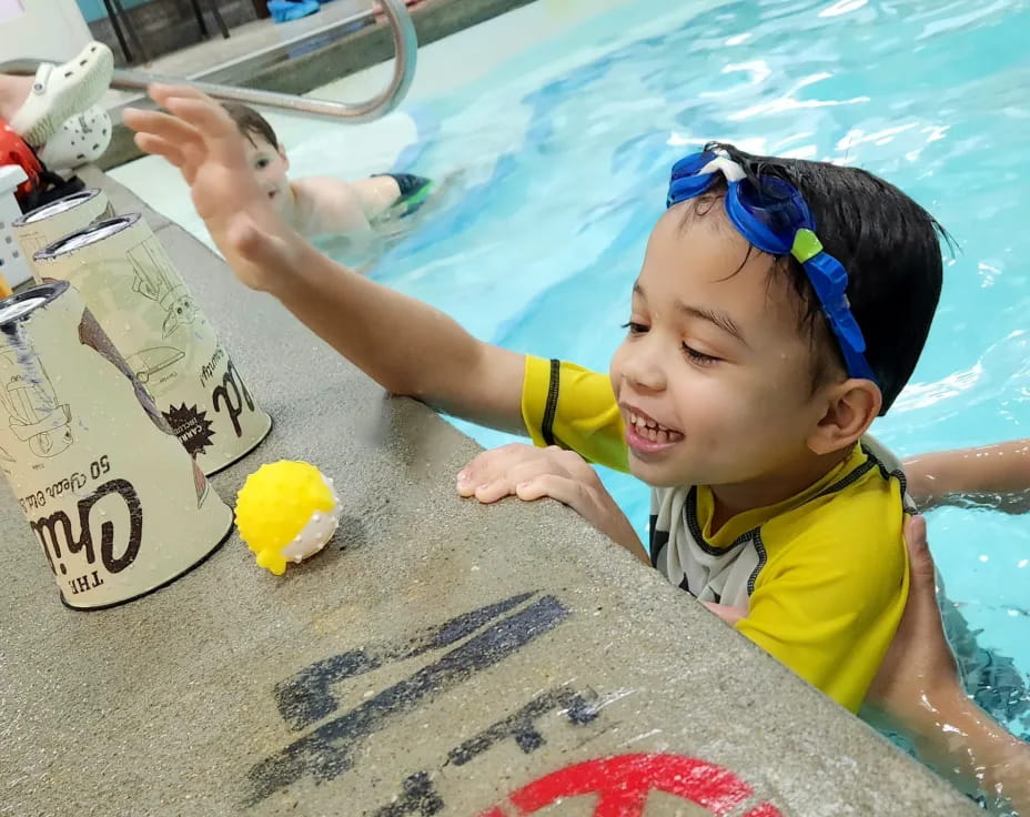 a child in a pool