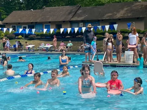 a group of people in a pool