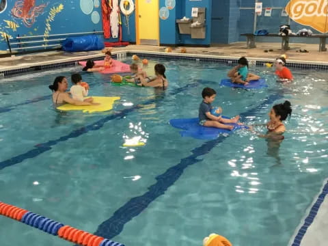 a group of people in a pool