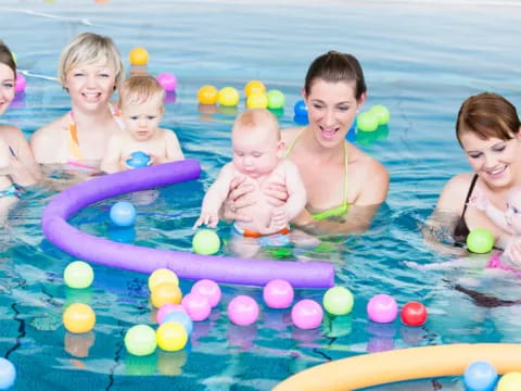 a group of kids in a pool