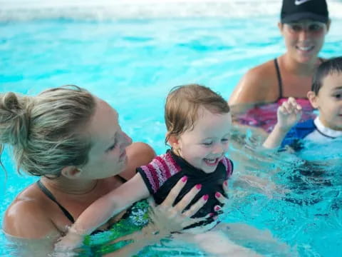 a group of people in a pool