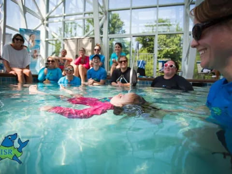 a group of people in a pool
