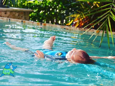 a person swimming in a pool