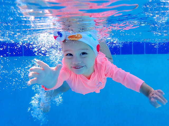 a child in a pool