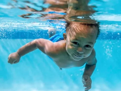 a person swimming in a pool
