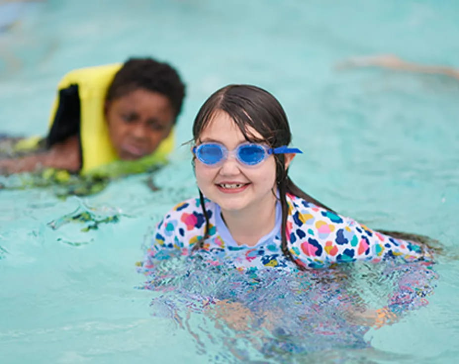 a person and a child in the water