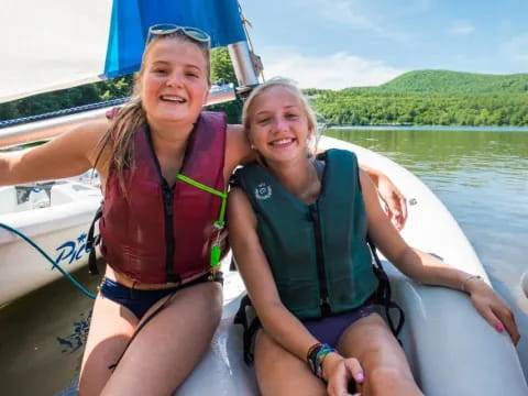 a couple of women on a boat