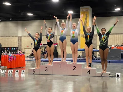 a group of women in a gym