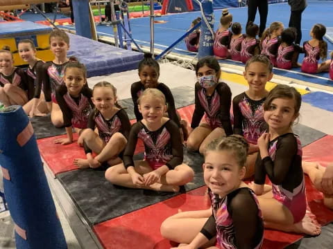 a group of children in a pool