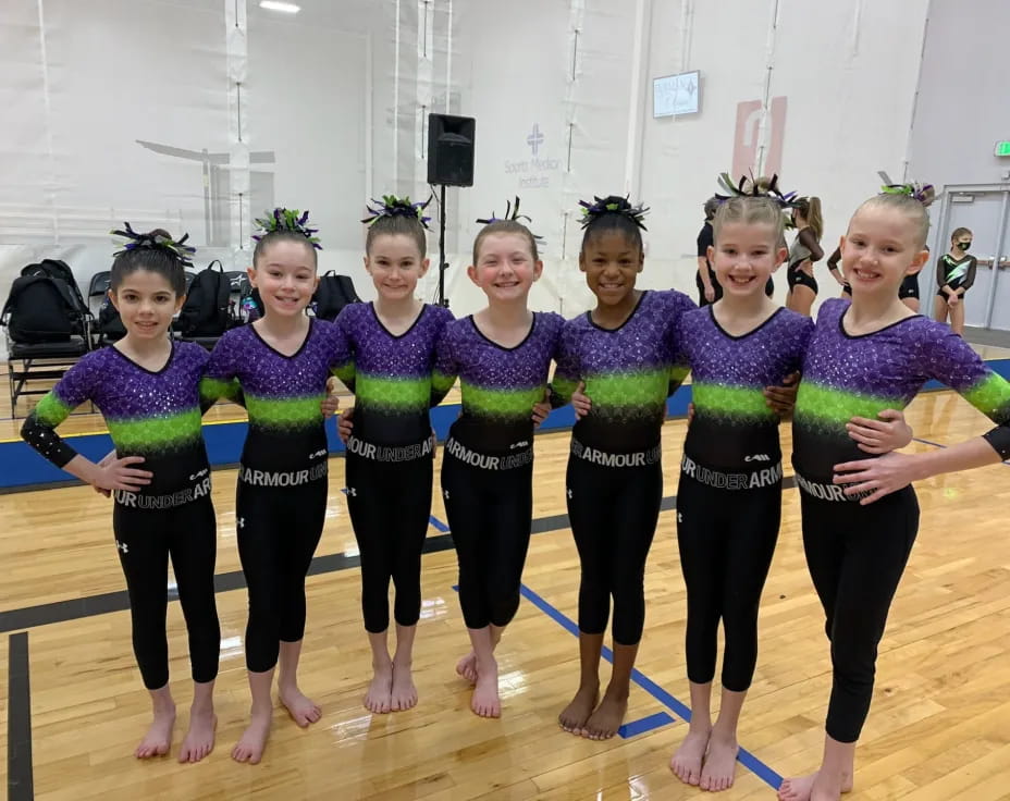 a group of girls in a gym