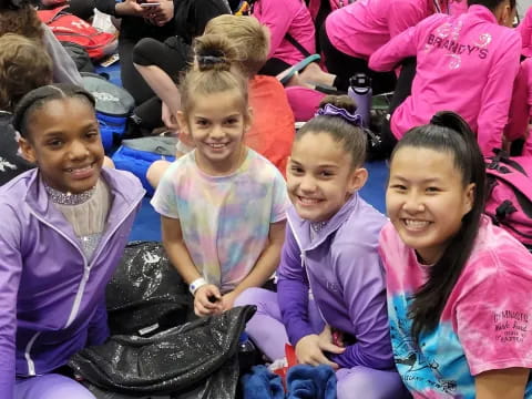 a group of girls in a tent