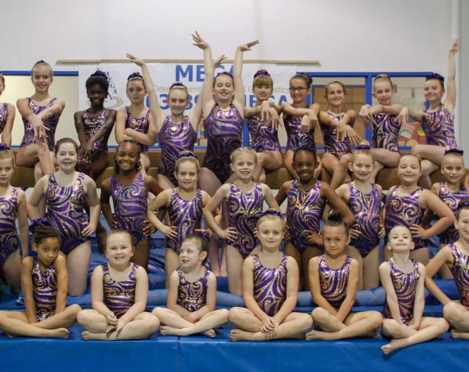 a group of women posing for a photo
