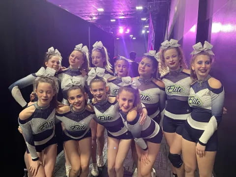 a group of women in a huddle