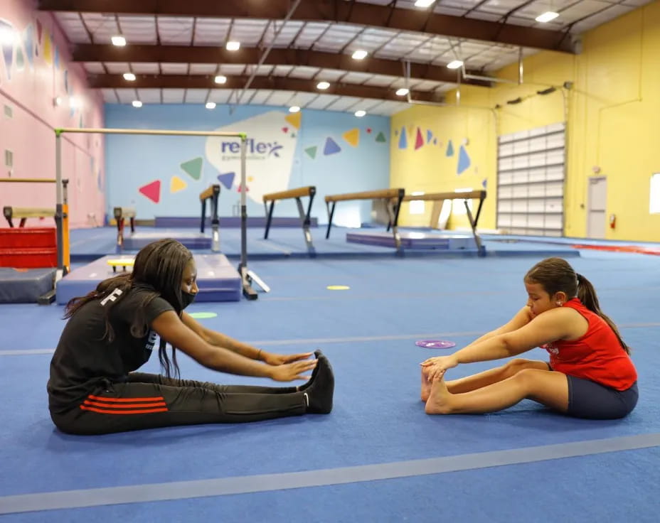 a couple of women exercising