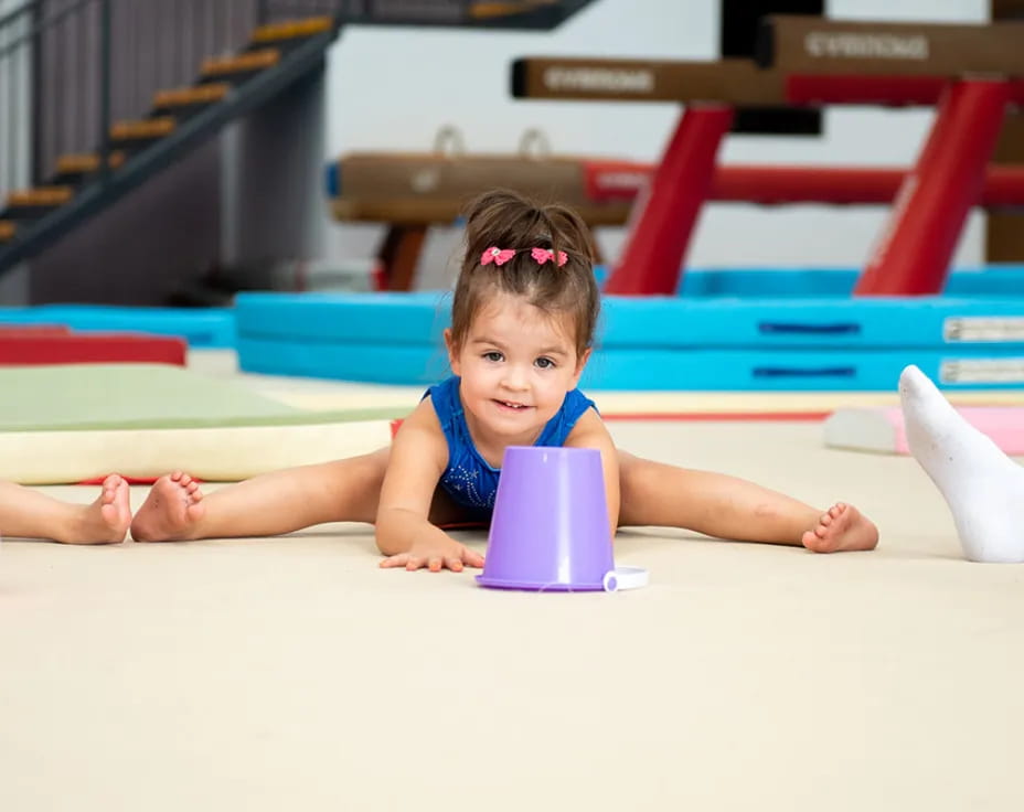 a baby lying on the floor