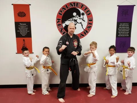 a person standing with kids