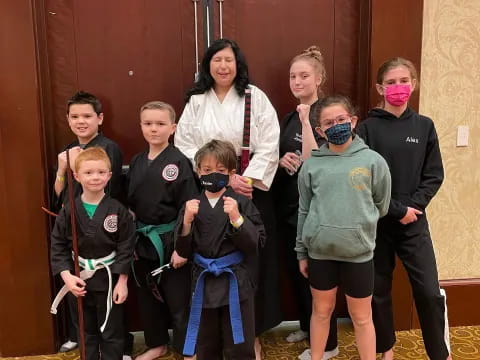 a group of people wearing masks