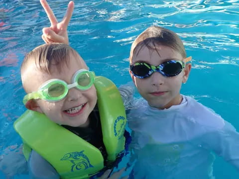 two boys in a pool