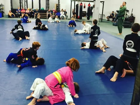 a group of people in a gym