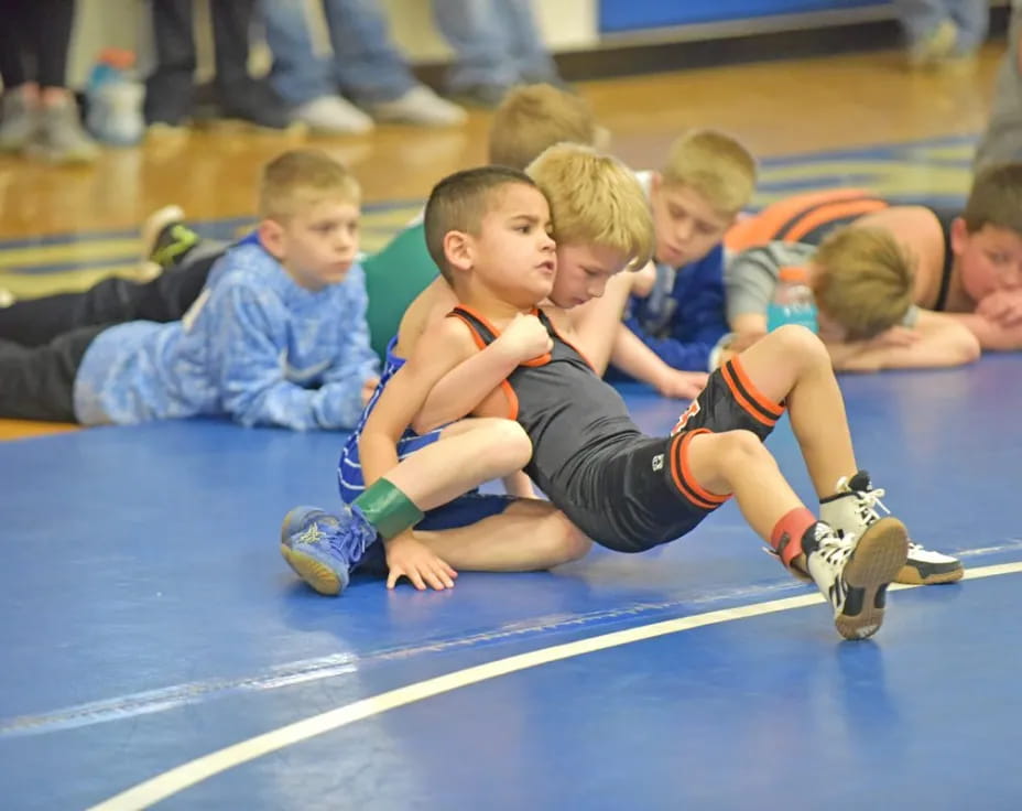 a group of boys playing football