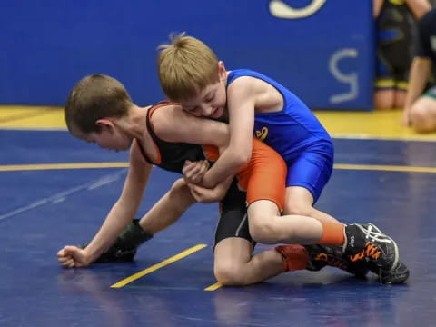 two boys playing a sport