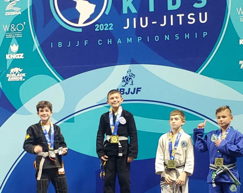 a group of men posing for a photo