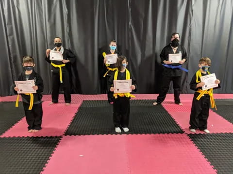 a group of people holding signs