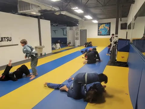 a group of people doing yoga