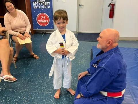 a person and a boy in a room