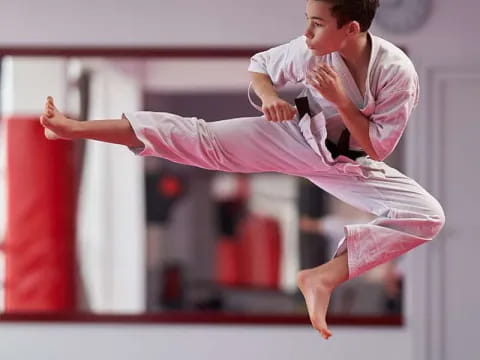 a man in a karate uniform