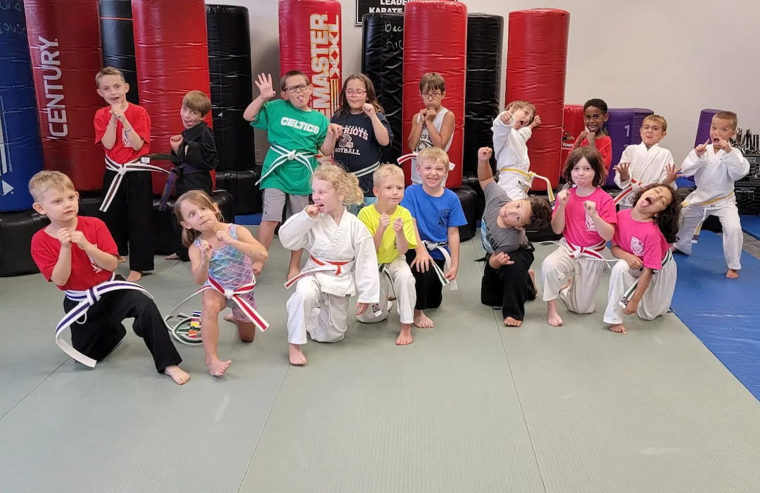 a group of children posing for a photo