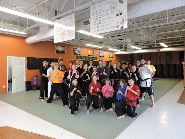 a group of people posing for a photo