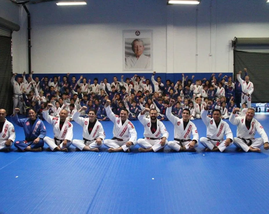 a group of people in white uniforms