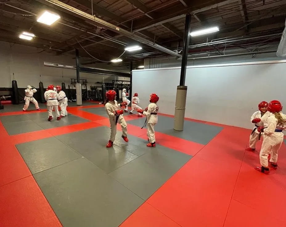 a group of people in white uniforms
