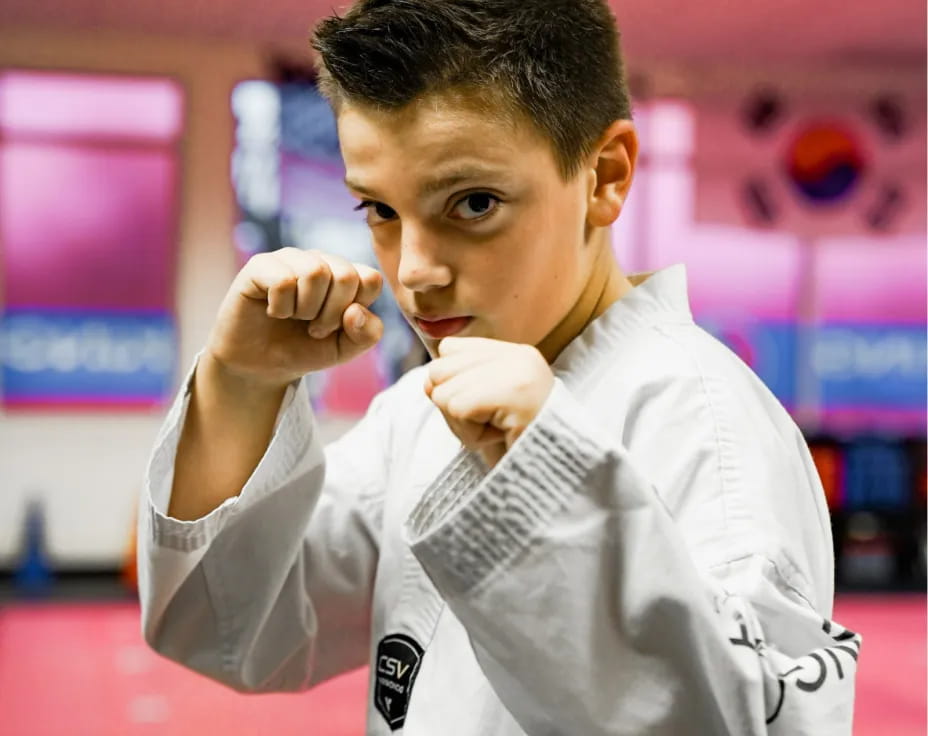 a man in a karate uniform