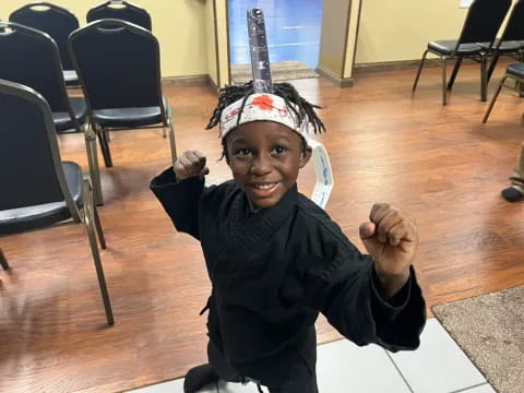 a boy wearing a garment