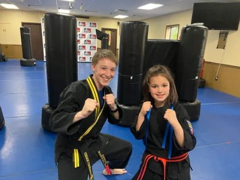 a man and a woman in a gym