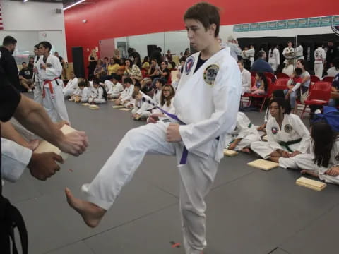 a man in a karate uniform