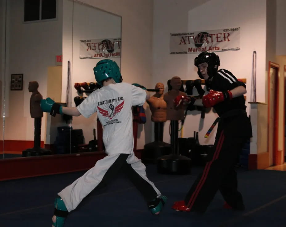 a couple of men in a hockey rink