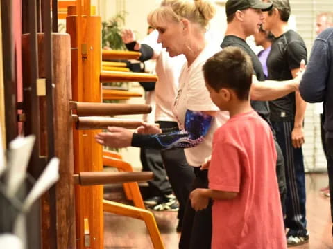 a person cutting a child's hair