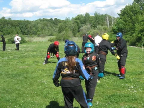 a group of people wearing helmets
