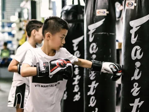 a couple of men wearing gloves
