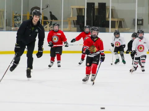 a group of people playing hockey