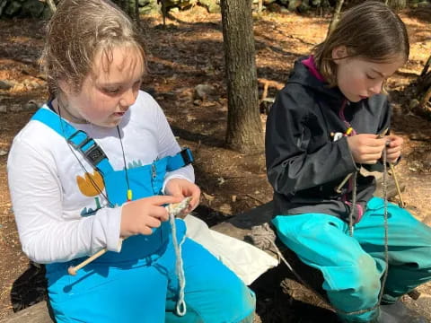 a person and a child in the woods