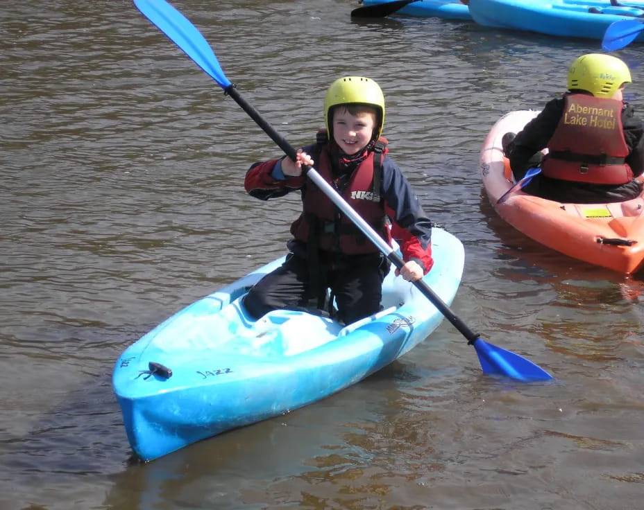 a couple of people in kayaks