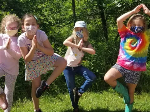 a group of girls wearing clothing