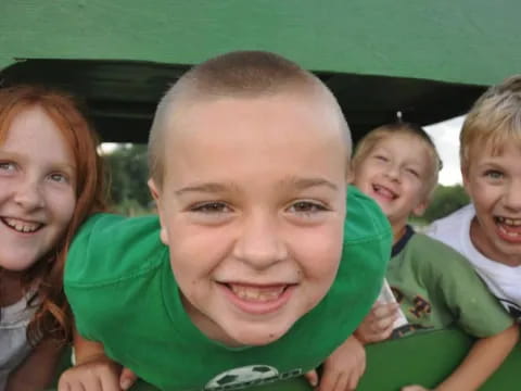 a group of children smiling