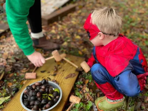 a baby playing with a stick