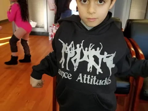 a boy in a black shirt