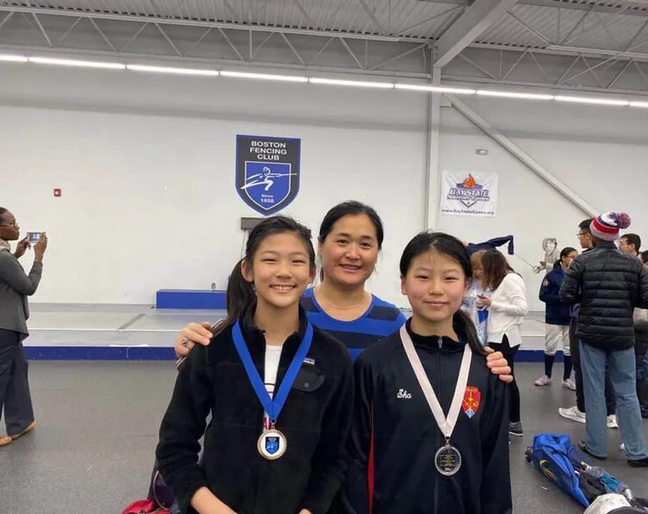 a group of women posing for a photo